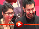 Aamir Khan posiert mit seiner Frau auf dem Berlinale-Teppich