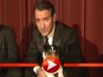 Jean Dujardin mit Filmhund Uggie und Kippe