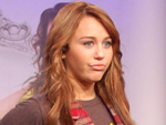 Miley Cyrus: Geht Paparazzo an die Gurgel