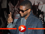Usher posiert für die Fotografen